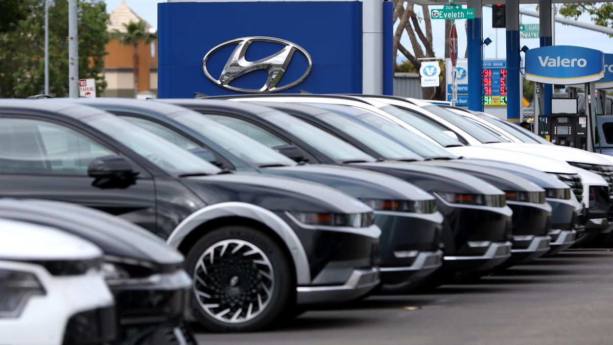 Hyundai vehicles displayed for sale at a new car dealership.