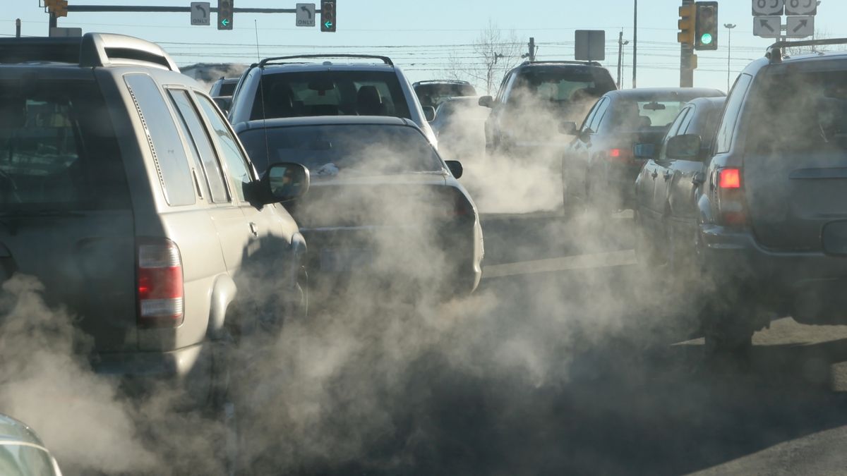Cars release exhaust fumes.