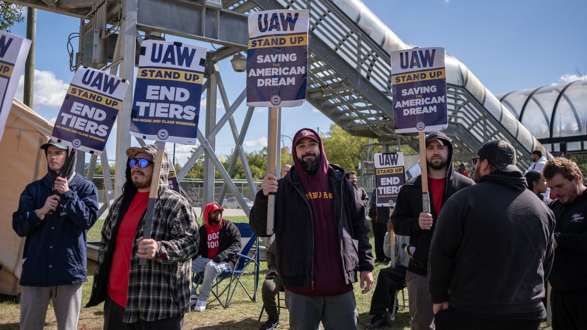 United Auto Workers members rally.