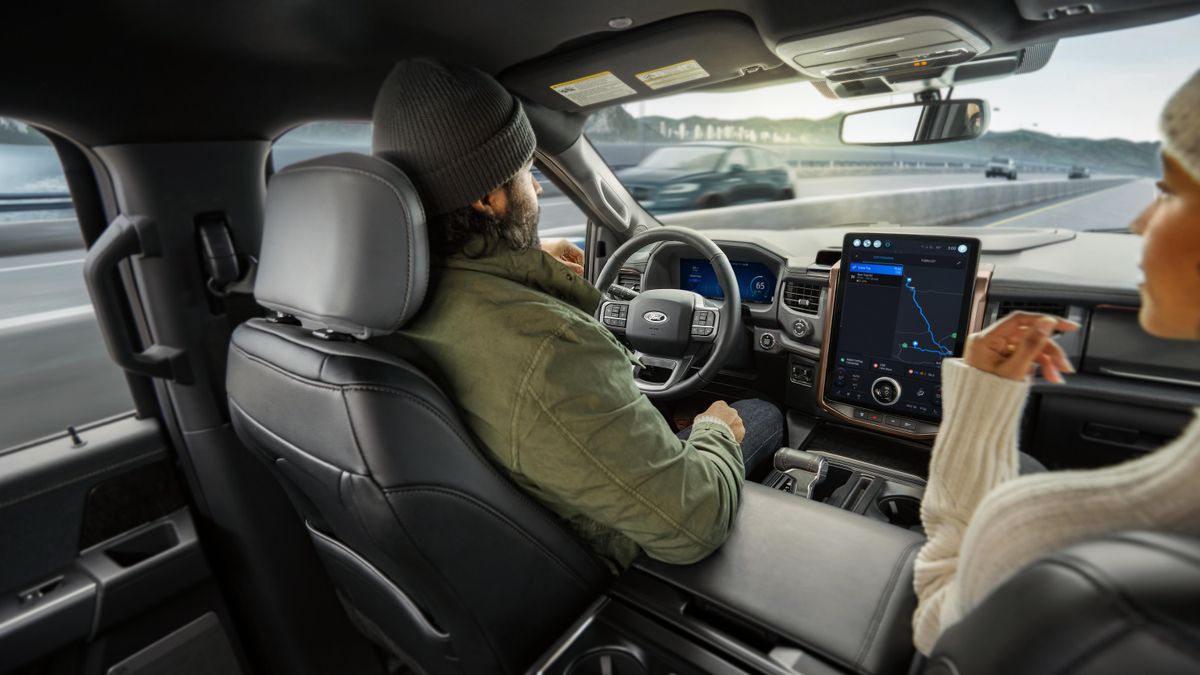 A driver using Ford's BlueCruise hands-free driver assist technology.